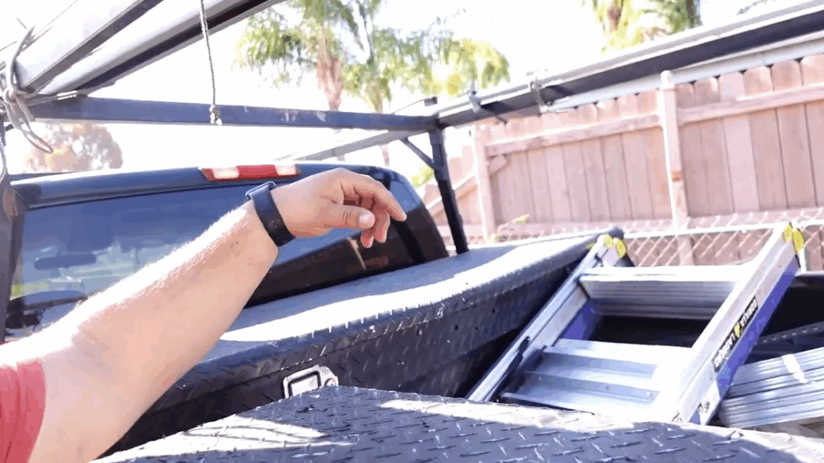 Best Tools to Fix Garage Door - A Practical Guide 2 Side view of Chevy Supervan with a built rack carrying parts