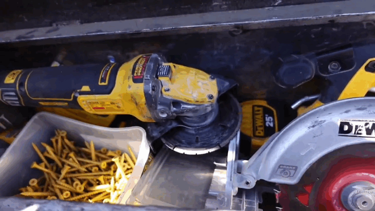 Best Tools to Fix Garage Door - A Practical Guide 4 Power tools: skill saw and finishing nailer on truck floor